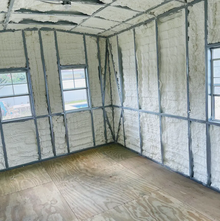 Closed-cell spray foam insulation applied to wall cavities in a residential project in Eagleton Village